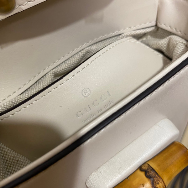 G*u*i bamboo mini handbag