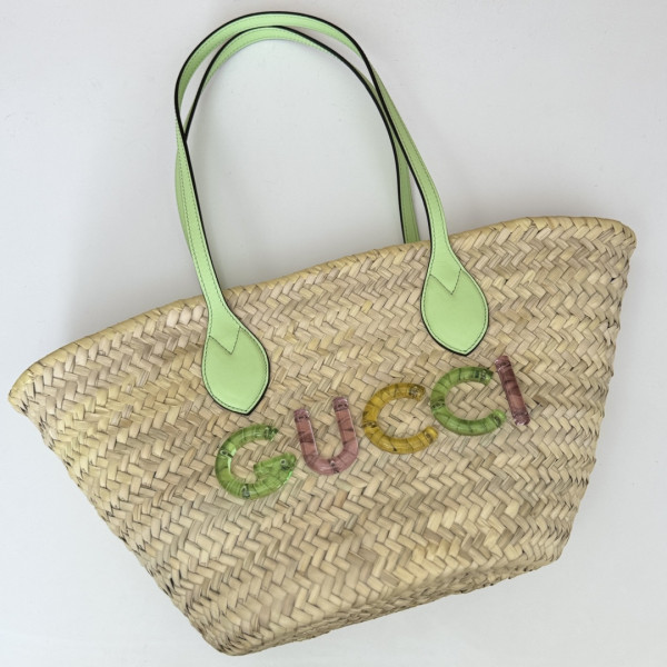 G*u*i small straw tote with G*u*i logo