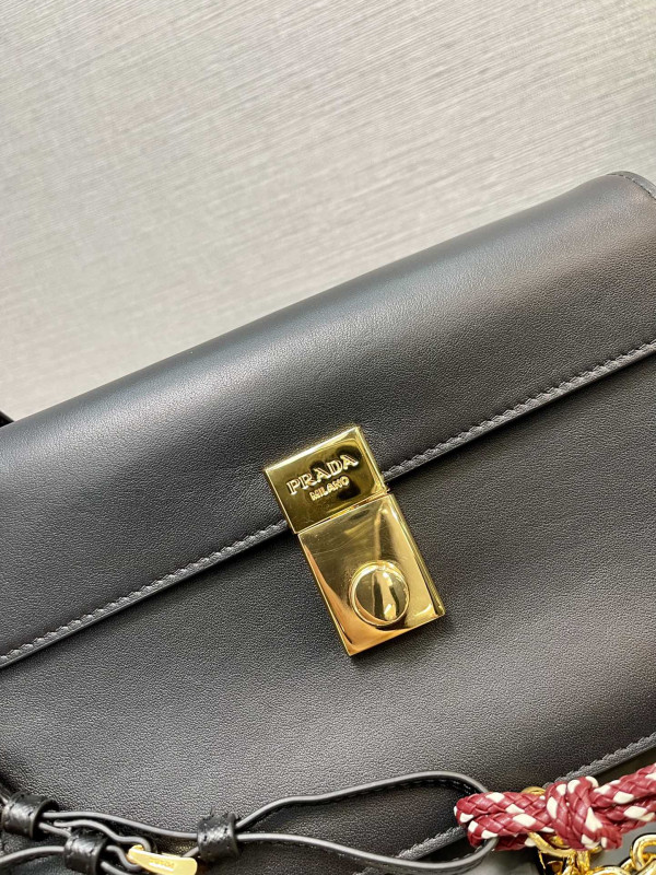 Pra*a soft sound small leather shoulder bag with charms