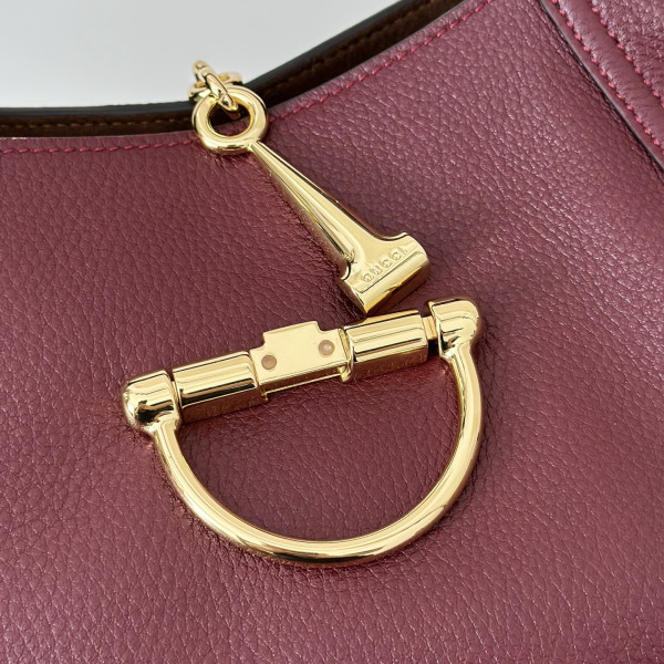 G*u*i softbit medium top handle bag